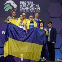 фото українських спортсменів з Прапором України
