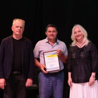 Перша заступниця начальника ОВА Наталя Заболотна та заступник начальника ОВА Сергій Здітовецький з учасником заходу
