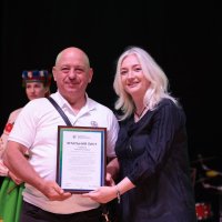 Перша заступниця начальника ОВА Наталя Заболотна з учасником заходу