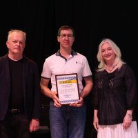 Перша заступниця начальника ОВА Наталя Заболотна та заступник начальника ОВА Сергій Здітовецький з учасником заходу