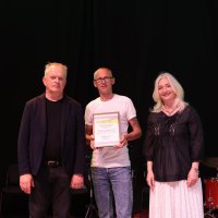 Перша заступниця начальника ОВА Наталя Заболотна та заступник начальника ОВА Сергій Здітовецький з учасником заходу