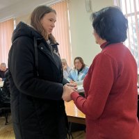 Вручення книги родинам загиблих захисників та захисниць