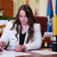 Учасниця зустрічі під час підписання Меморандуму