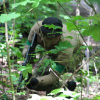 Учасник заходу з навчальною зброєю